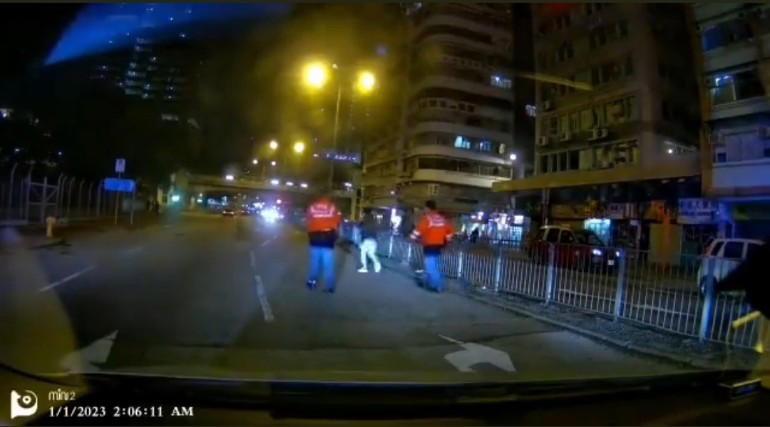 Hong kong man fakes being hit by car and rolls around on the ground dramatically for 2 minutes