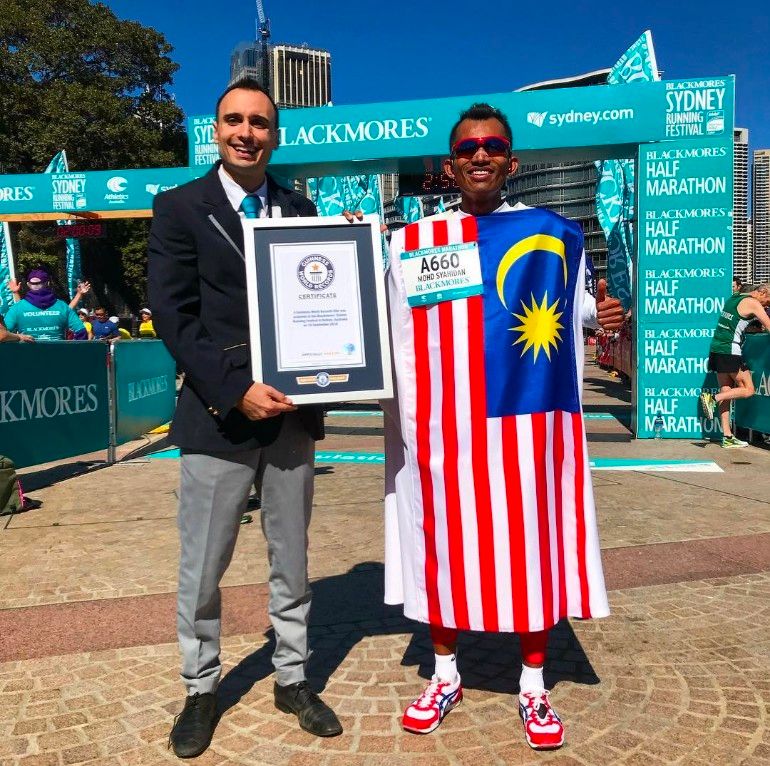 M'sian marathoner sets guinness world record by completing full marathon in traditional baju melayu under 3 hours