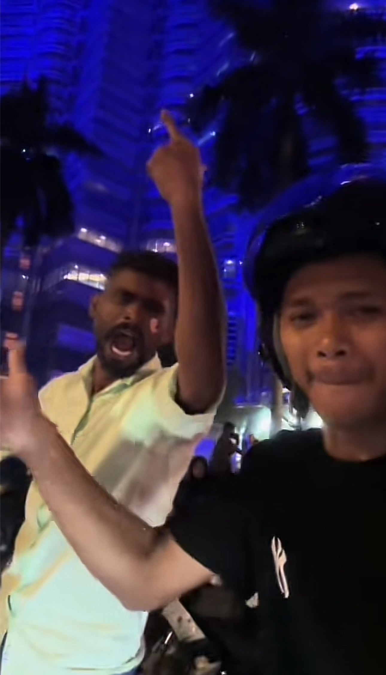 Indian man screaming merdeka at kl