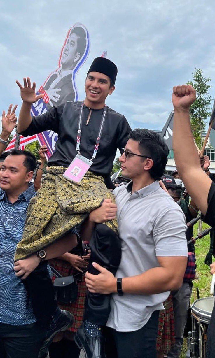 M'sian netizens are going absolutely nuts over syed saddiq's buff bodyguard