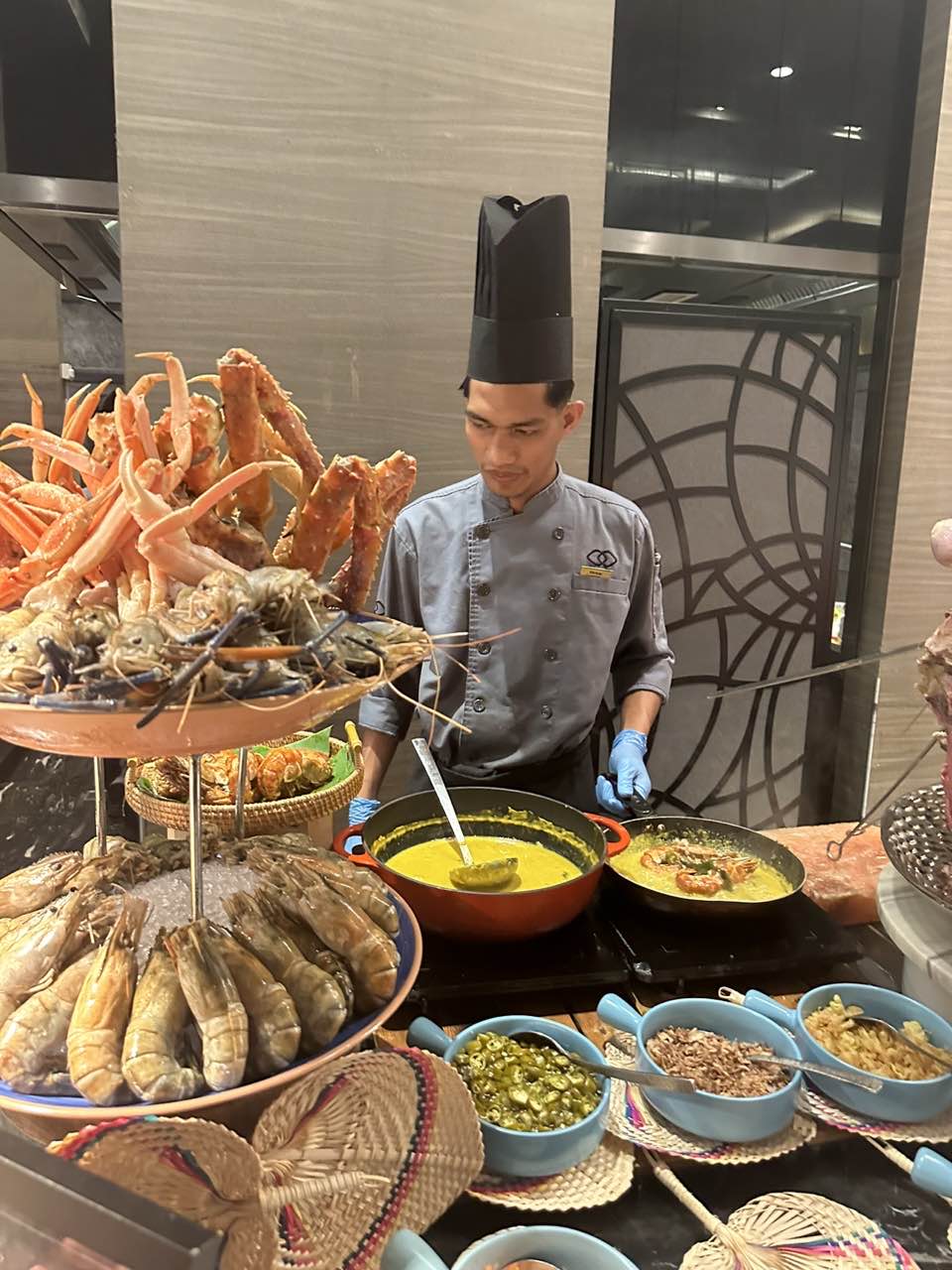 Chef cooking at a buffet setting