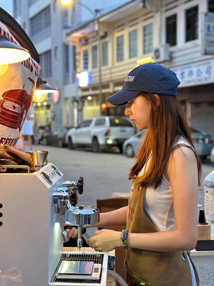 Leah making coffee at the roadside coffee shop