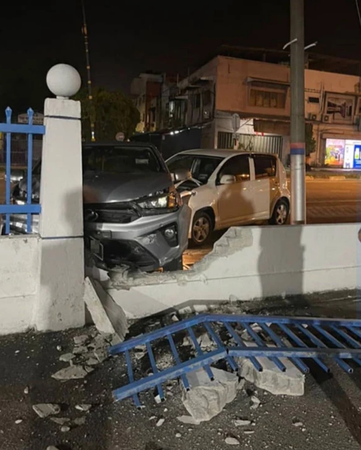 19yo m’sian crashes myvi into bezza and police station wall, found not to have driver’s license