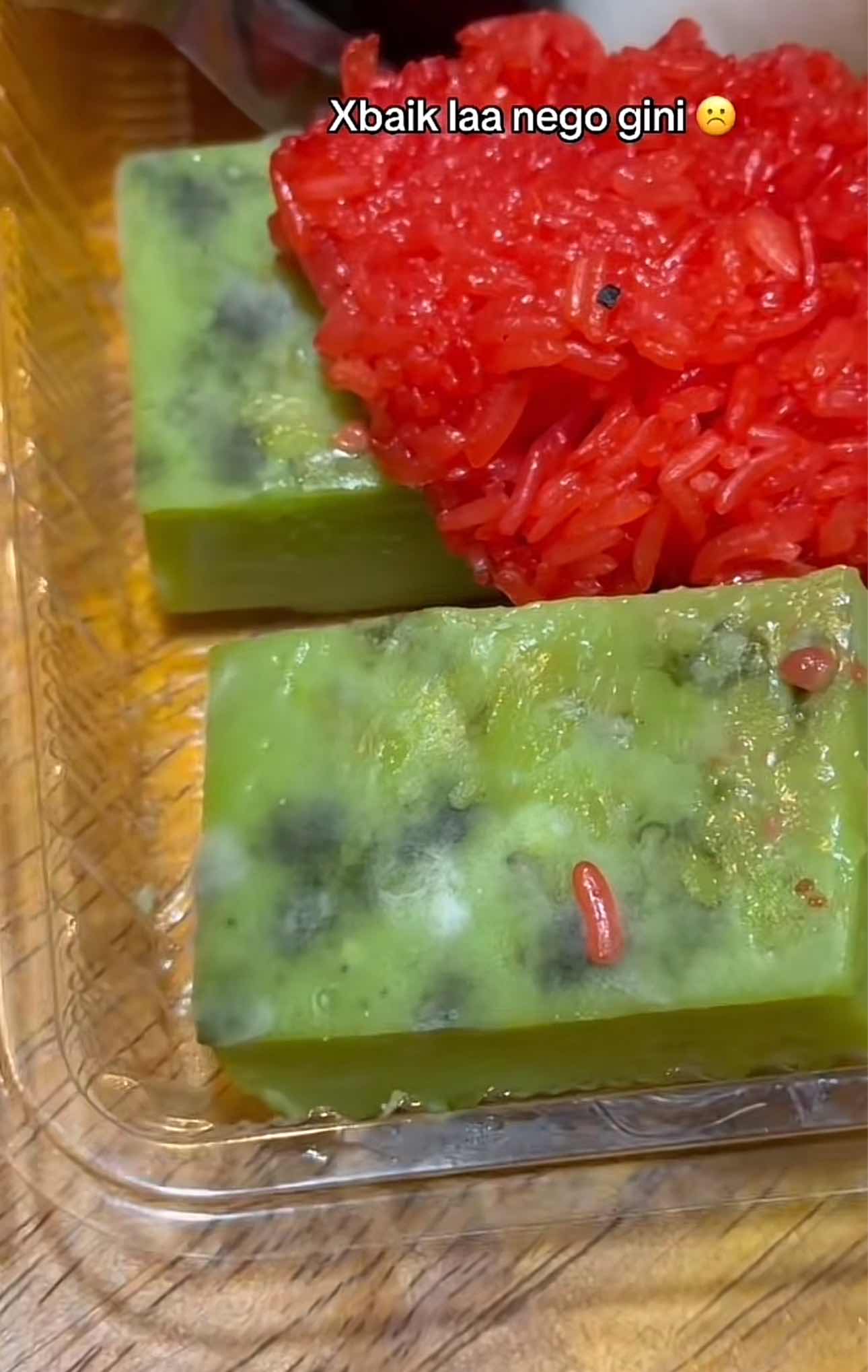 Kuih filled with mold on top of it