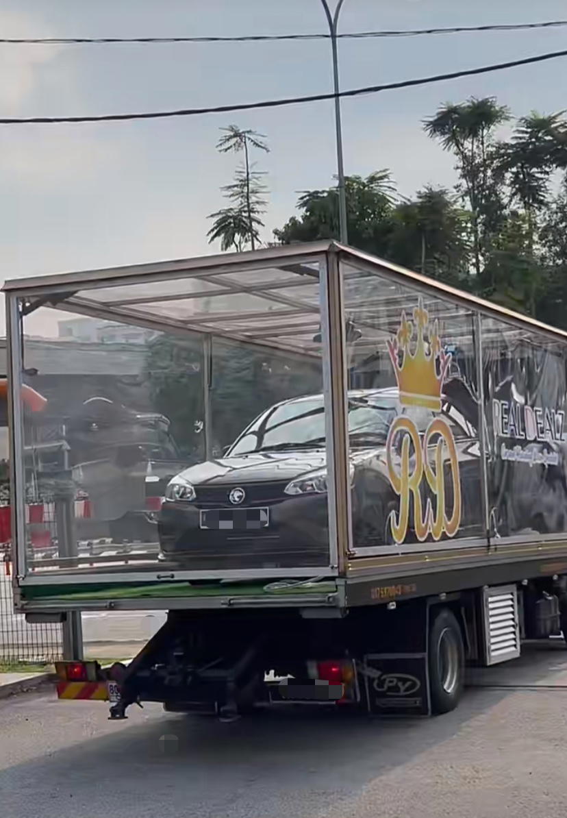 M'sians wowed to see proton saga be delivered from kl to jb in transparent truck meant for luxury cars | weirdkaya