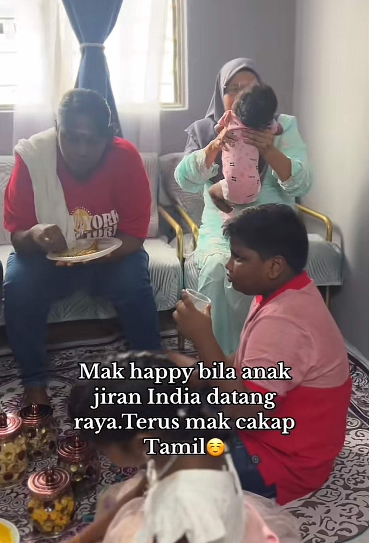 M'sian woman playing her with neighbor's daughter