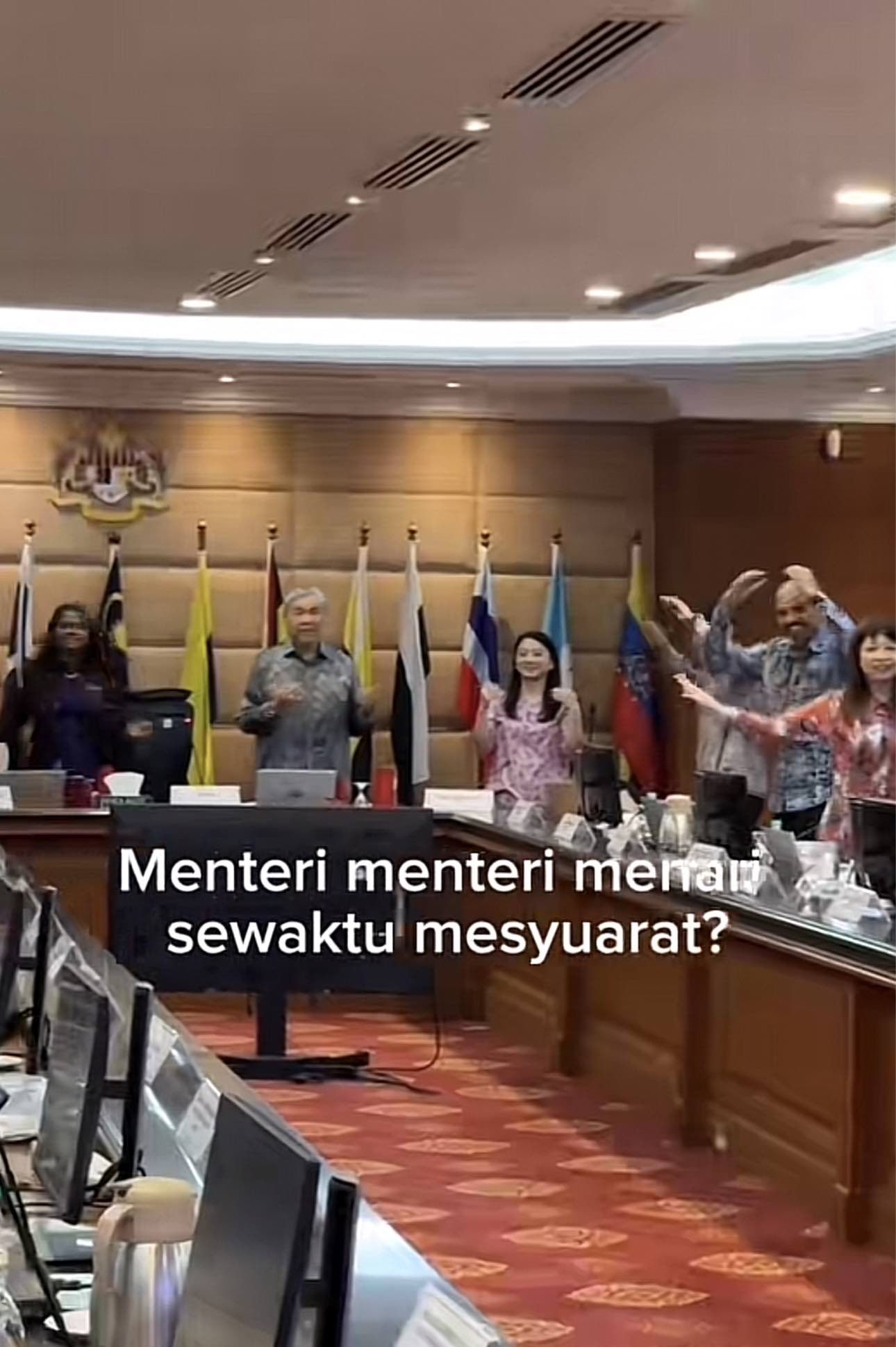 Ministers dancing during meeting