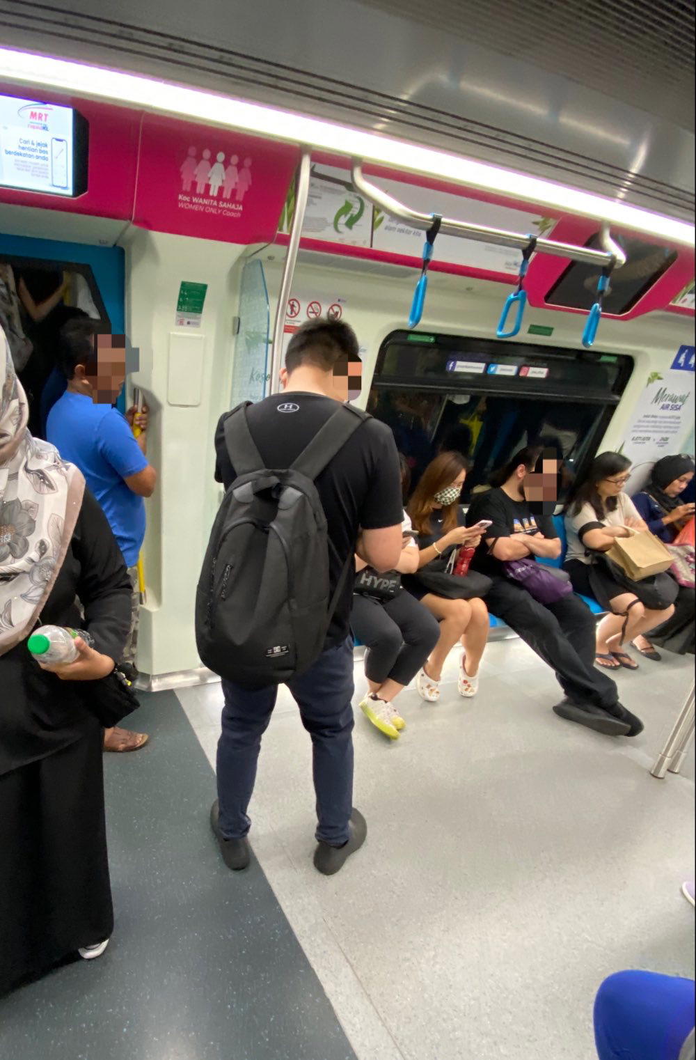 M'sians confused by men who can't seem to avoid female-only coach despite clear signage | weirdkaya