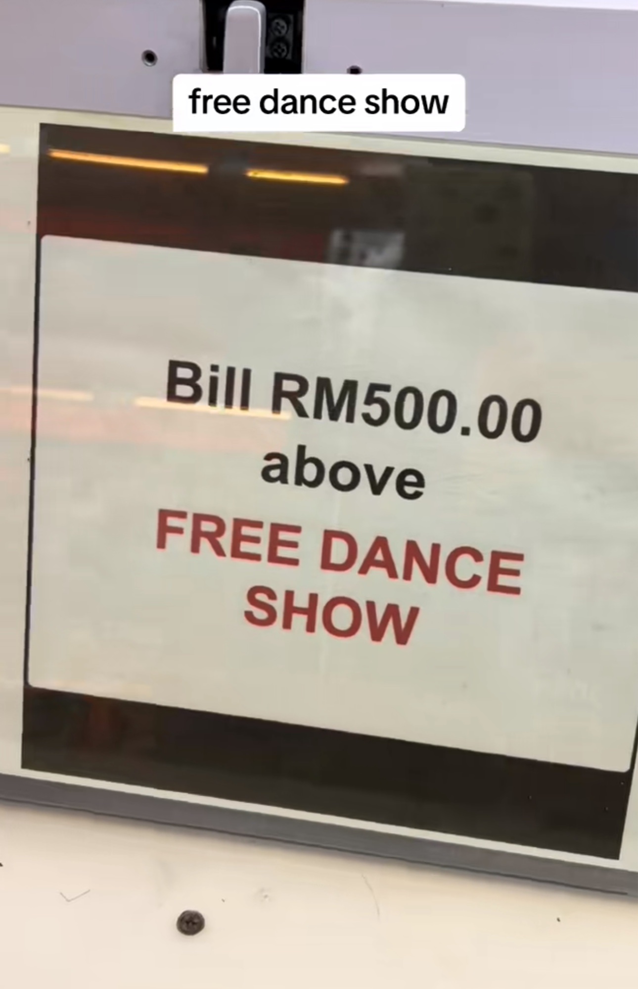 Display showing free dance show available after purchasing rm500 or more