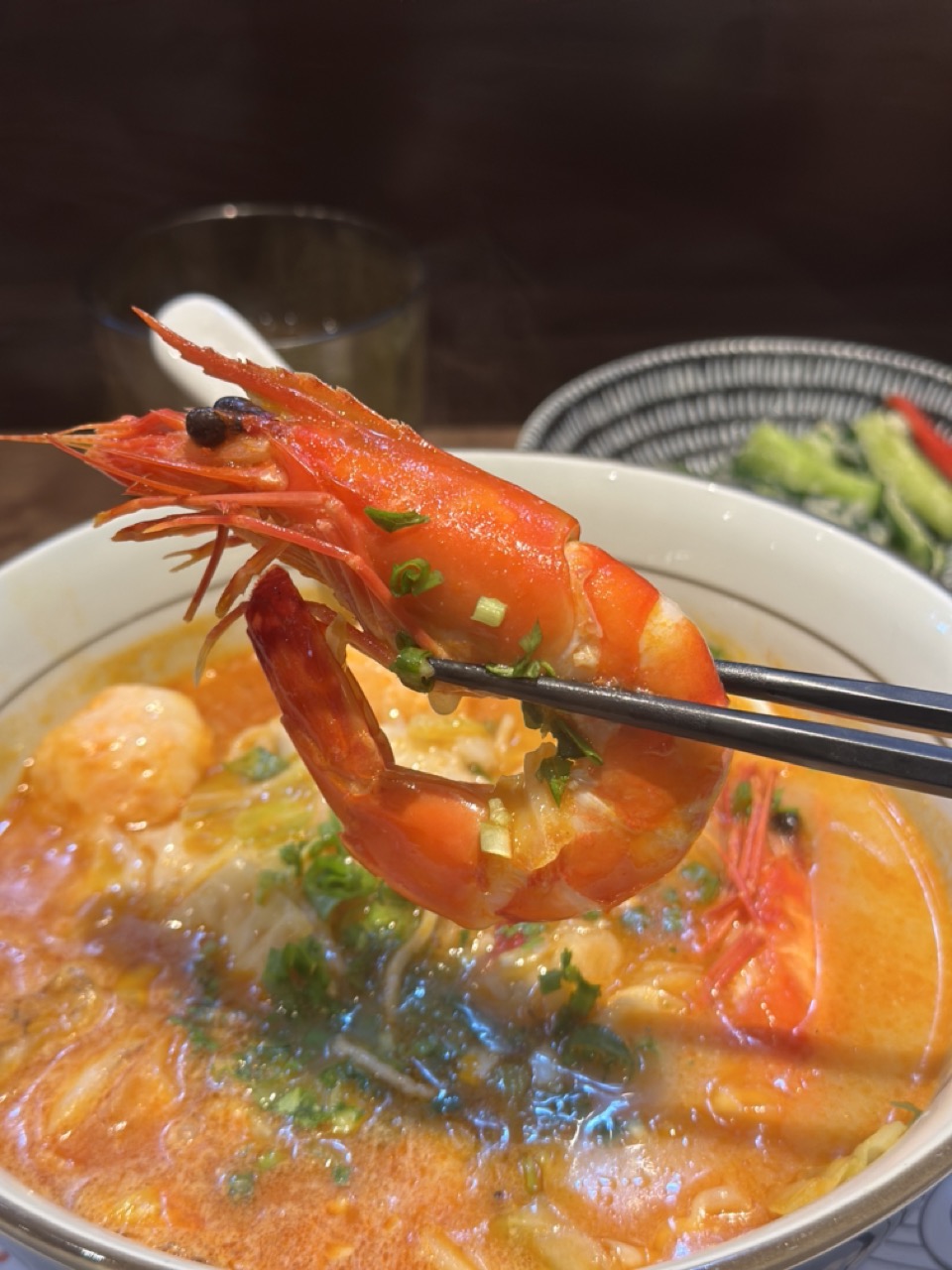 Le trio signature shrimp ramen huge shrimp