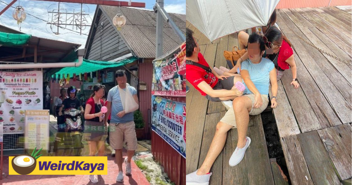 Sg tourist falls through decayed plank at penang's chew jetty, injuring his arm | weirdkaya