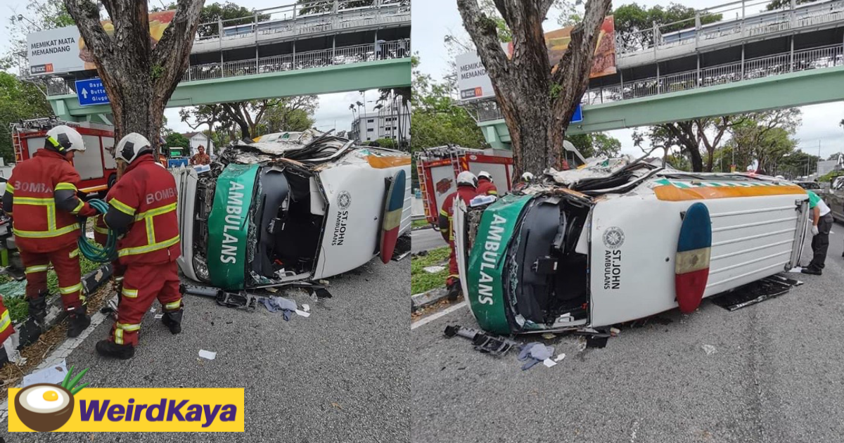 St john ambulance carrying patient flips over after slamming into divider in penang | weirdkaya