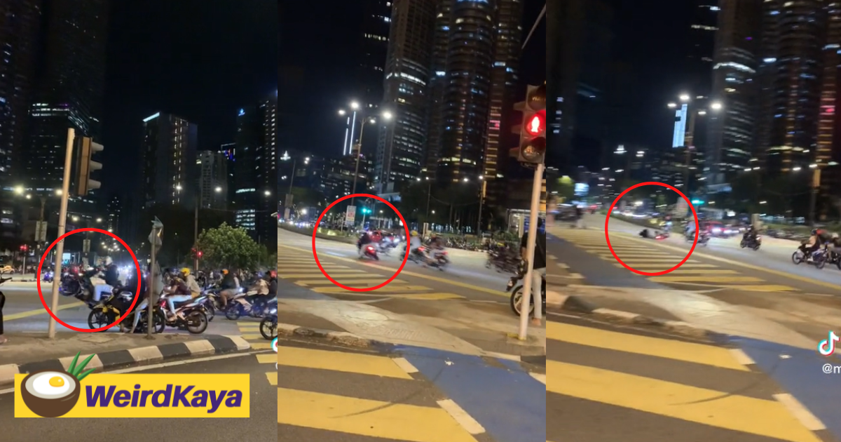 'mat rempit' tries to show off moves with a wheelie at klcc, falls down & humiliates himself | weirdkaya