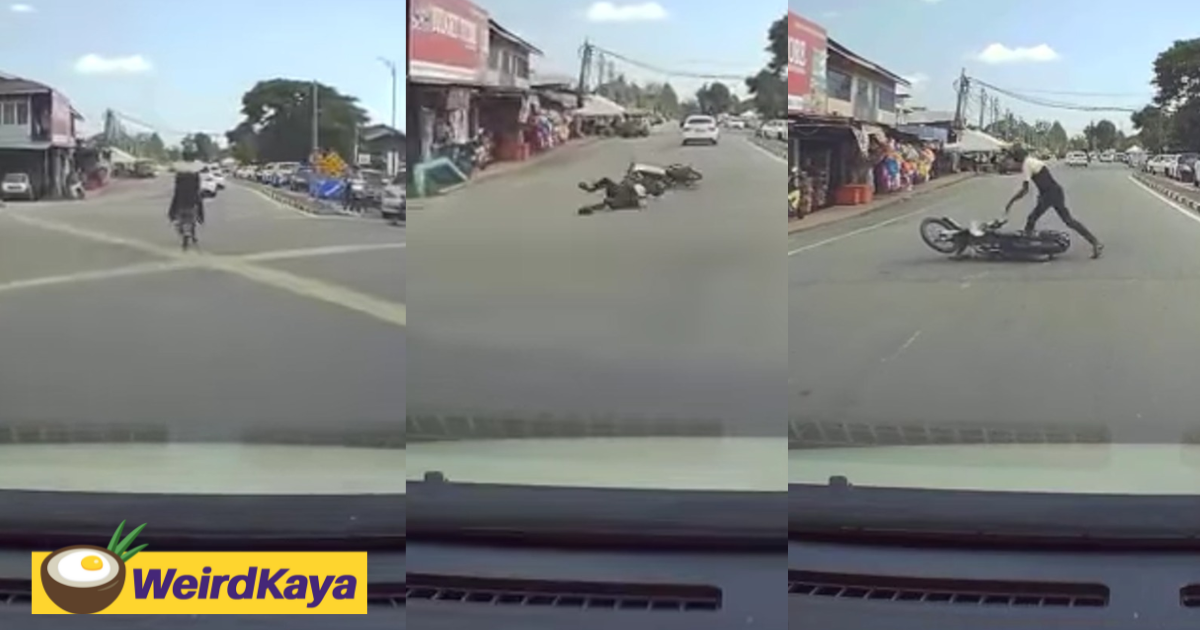 M'sian man performs 'wheelie' stunt at intersection, falls down and embarrasses himself | weirdkaya