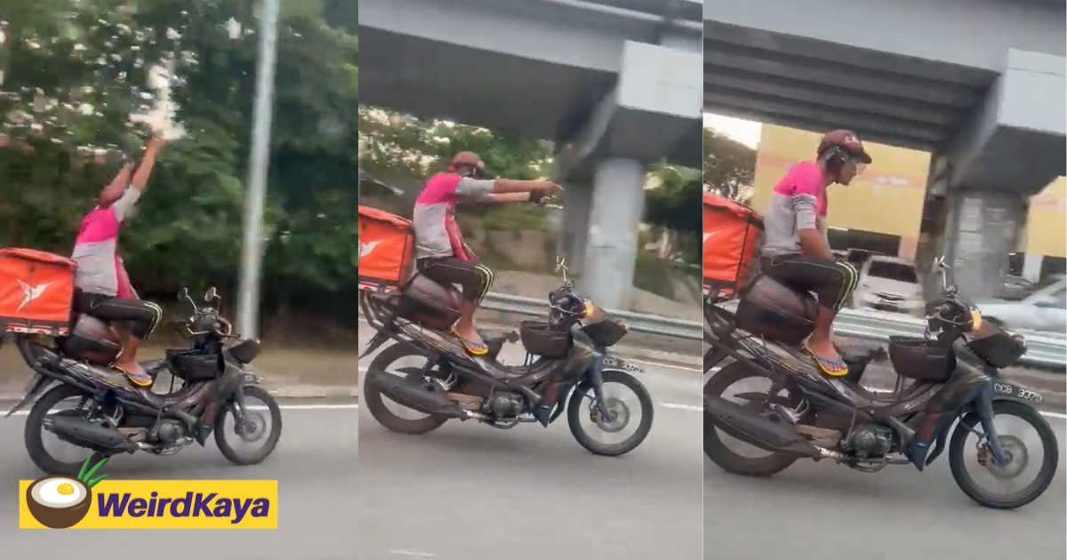M'sian delivery rider seen riding motorbike with no hands, nabbed by police for endangering public safety | weirdkaya