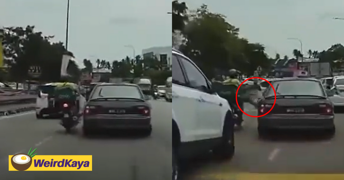 M'sian grab rider angrily kicks car which cut into his lane without warning | weirdkaya