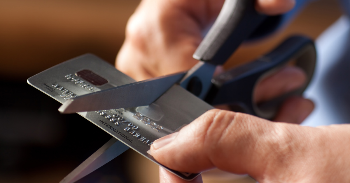 Cut credit/debit cards with scissor