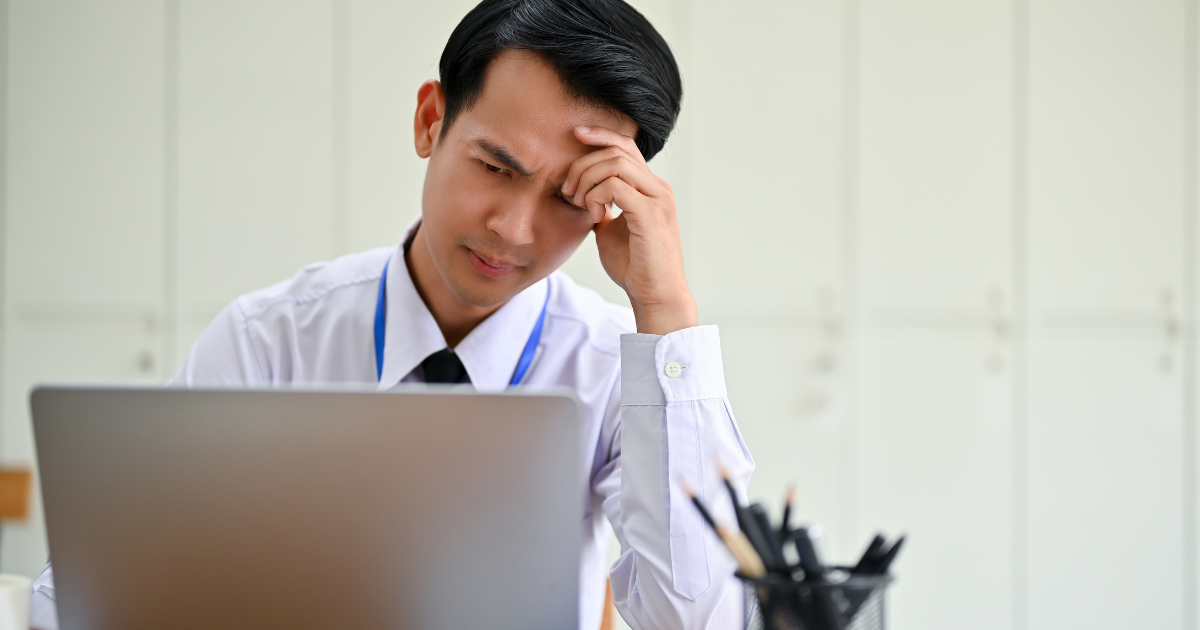 Frustrated man at workplace