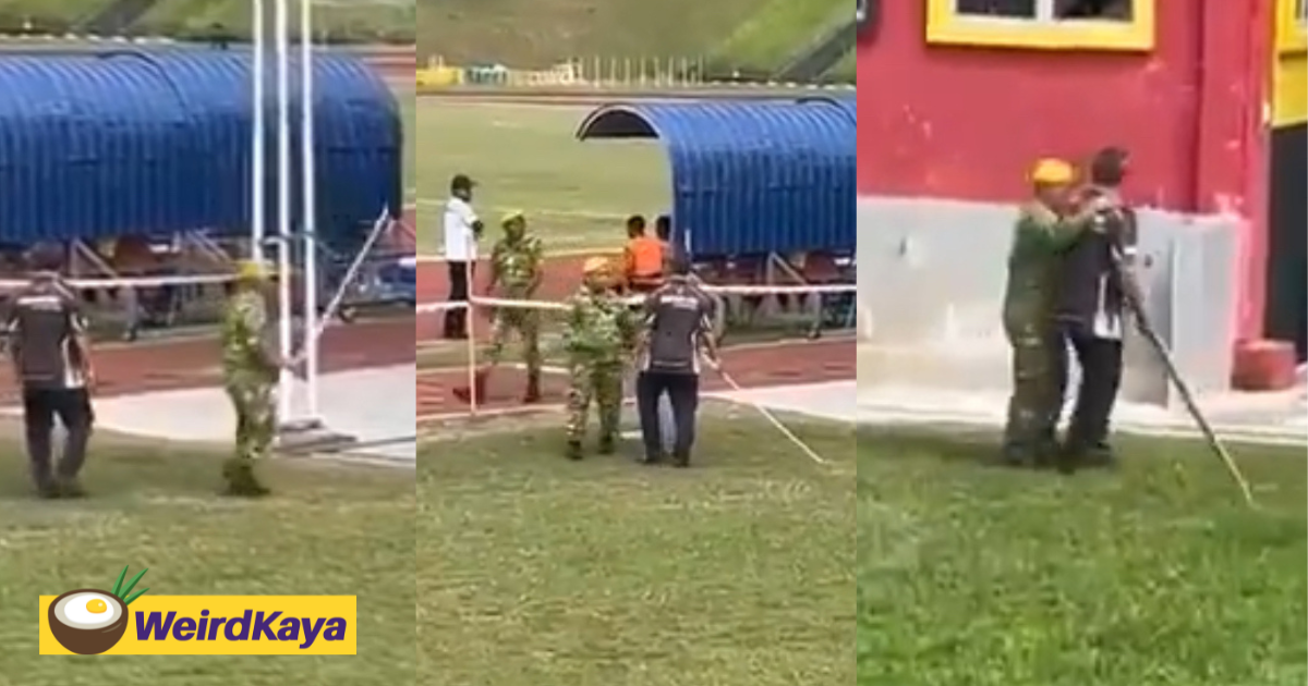 M'sian man storms towards pitch with iron rod after son gets a red card from referee during football match | weirdkaya