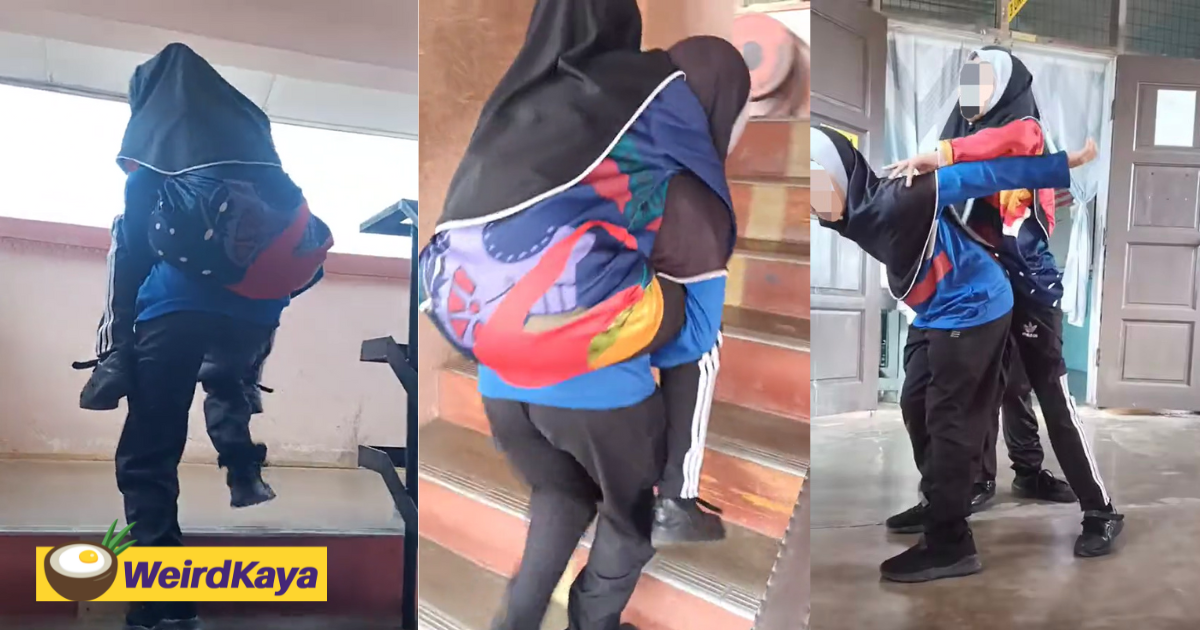 M'sian girl piggybacks oku classmate up the stairs, netizens touched by their friendship | weirdkaya