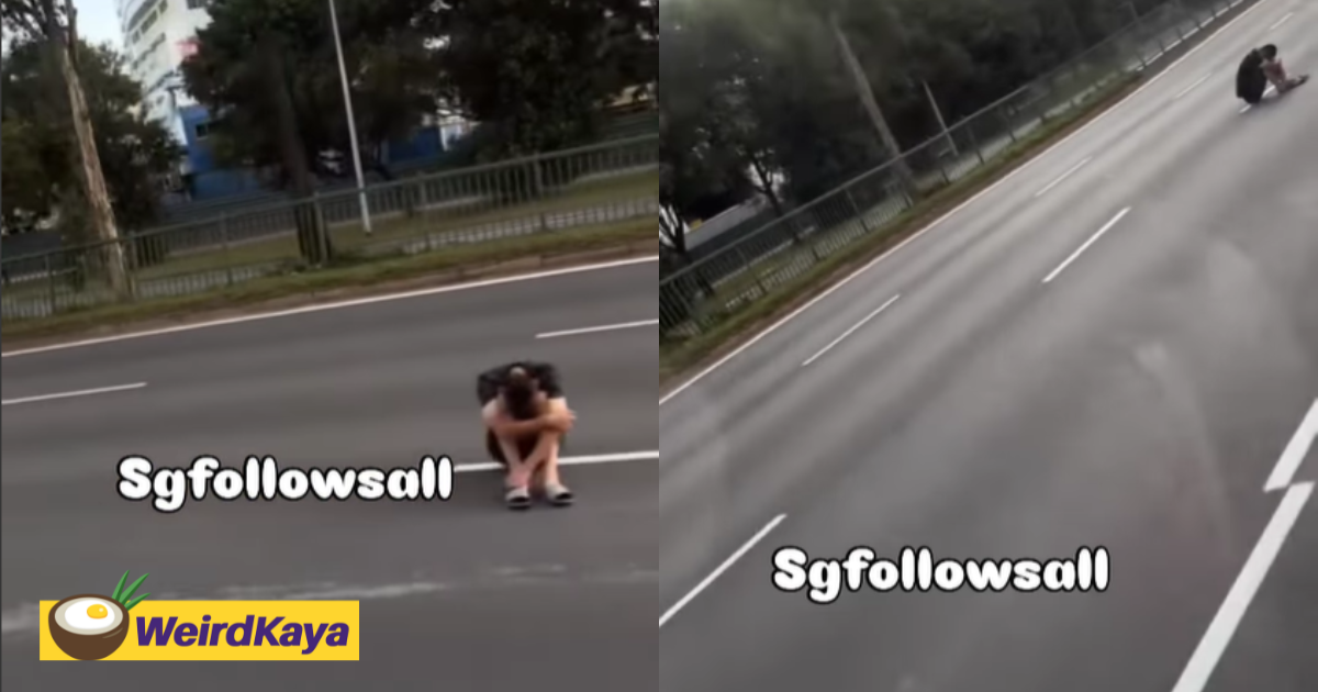 Man sits in the middle of road with head between his knees in s'pore, sparks concern | weirdkaya