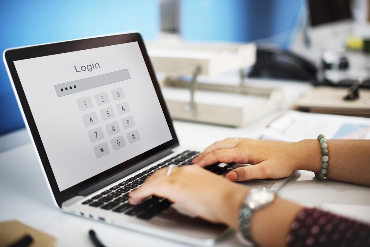 Woman logging in with her password