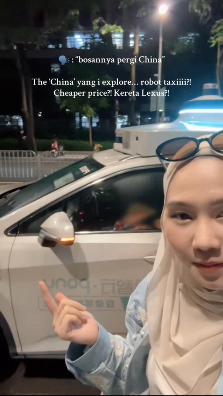 msian rides self-driving taxi in China excellent