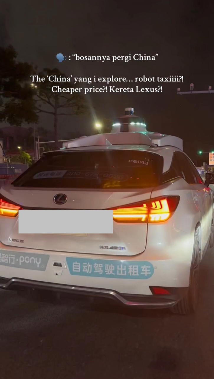 msian rides self-driving taxi in China Lexus