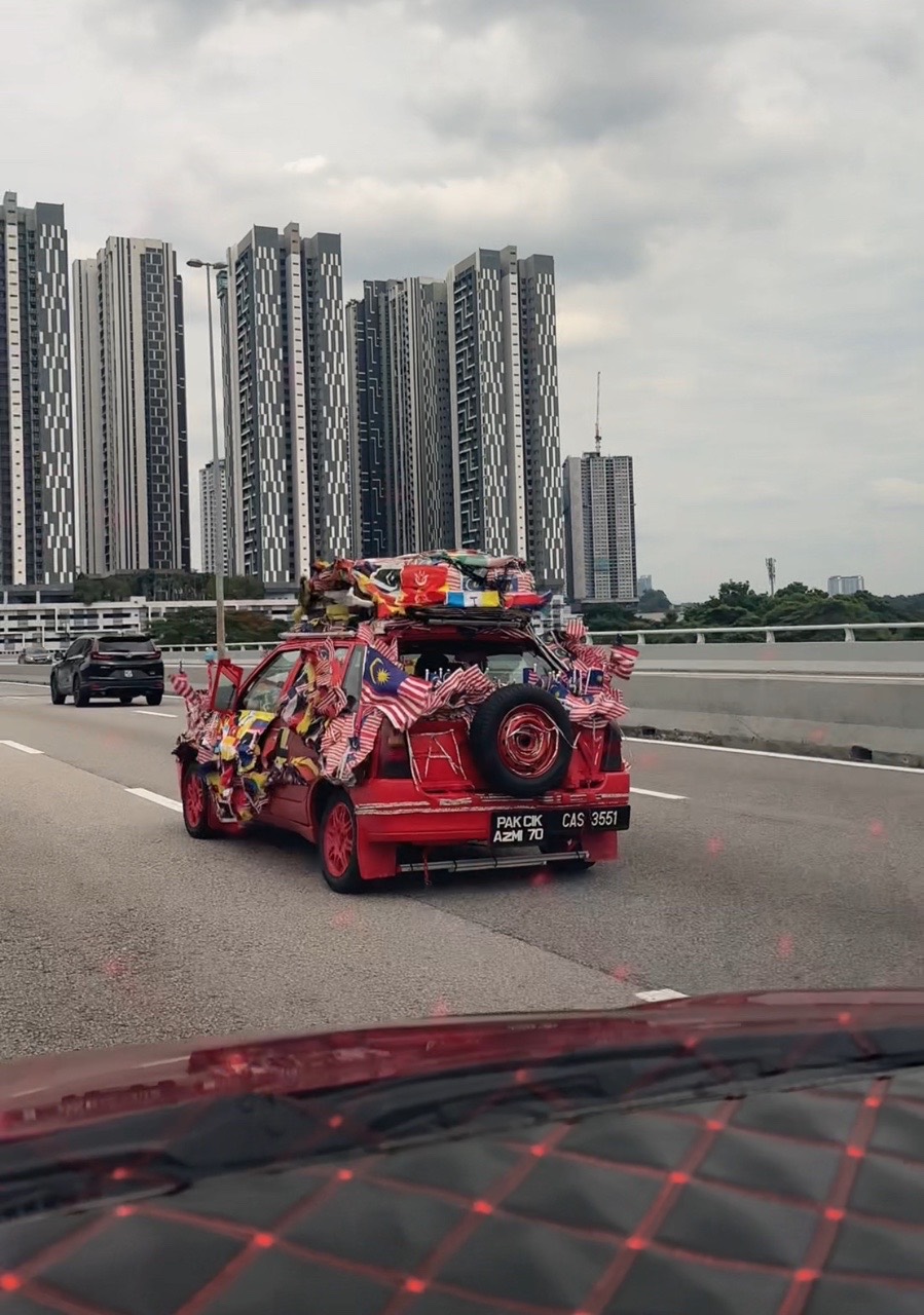 Car covered with flags