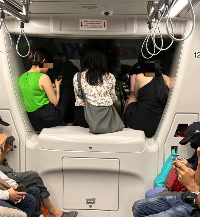 Lrt commuters seen sitting on ledge despite 'do not occupy' sign, netizens shocked | weirdkaya