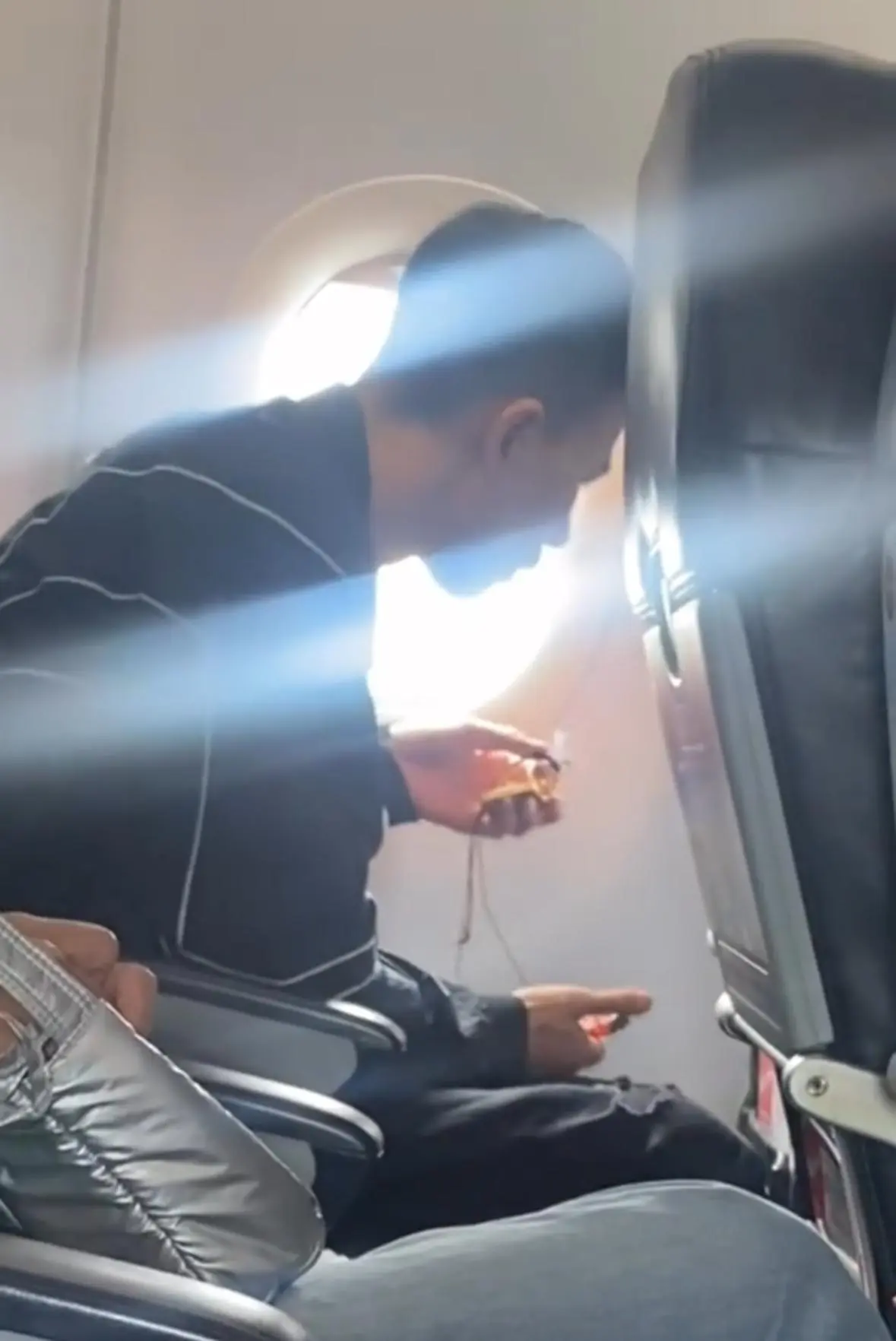 Man Caught Using Lighter To Burn Object During Plane’s Final Descent