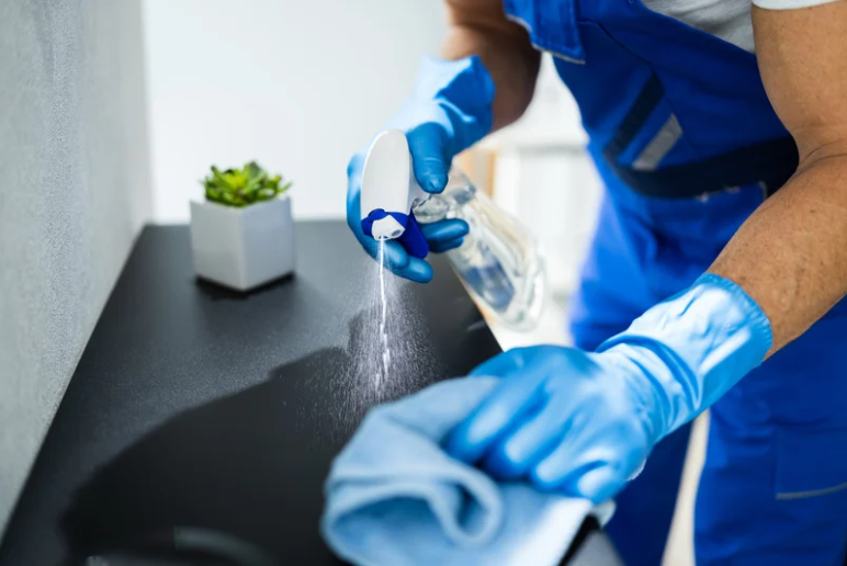 Man cleaning the counter