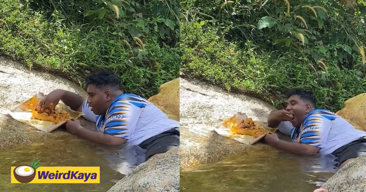 M’sian man eats nasi campur while taking a dip inside river | weirdkaya