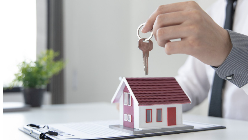 Man getting the keys to a new house