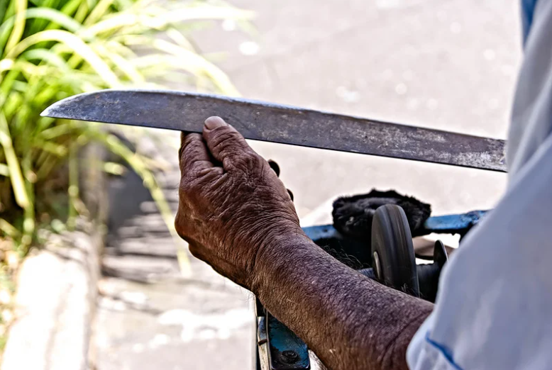 man holding machete
