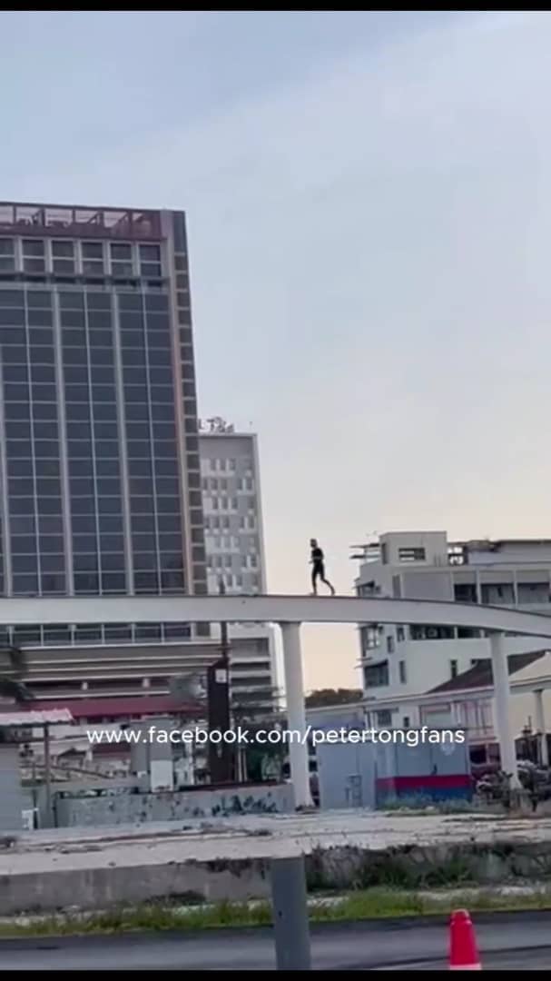Man jogging on monorail track