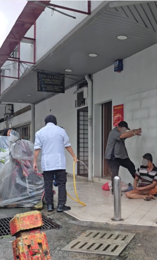 Man kicks homeless man