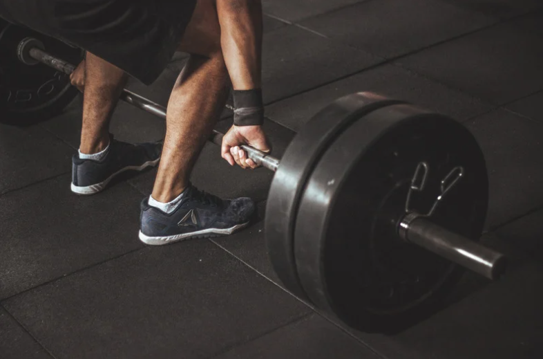 Man lifting dumbbells