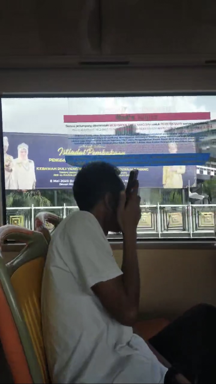 M'sian man looks away after taking photos and videos of woman on the bus