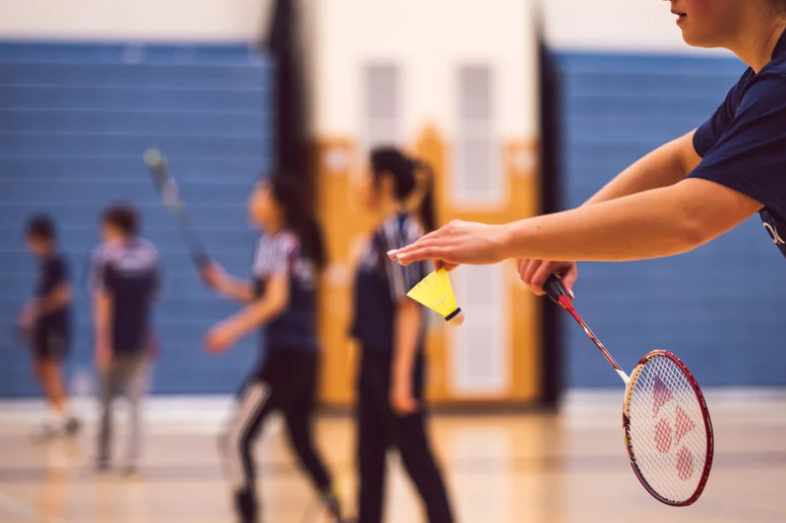 Man playing badminton