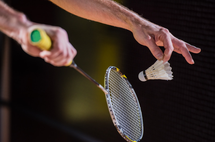 Man playing badminton