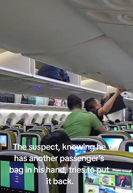 Man searching through luggages suspiciously (1)