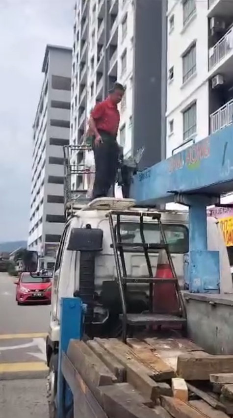 Man standing on the crane