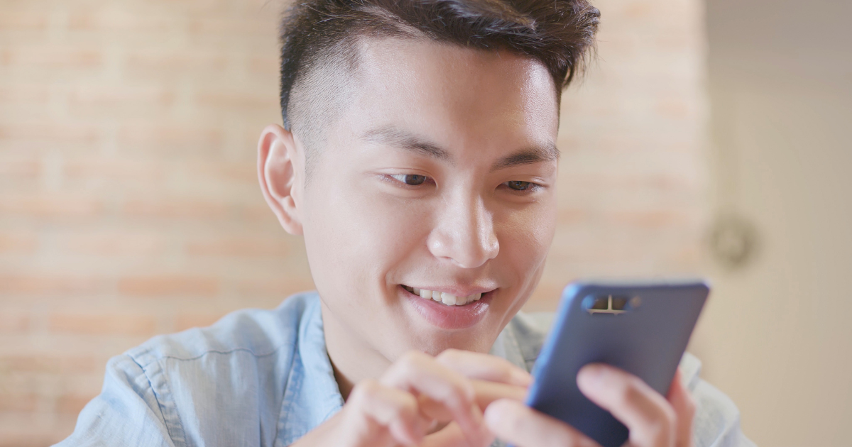 man texting