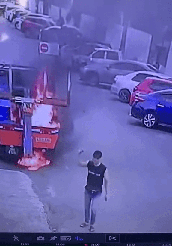 Man walks away after setting tow truck on fire