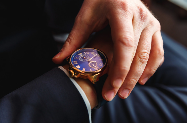 man wearing luxury watch