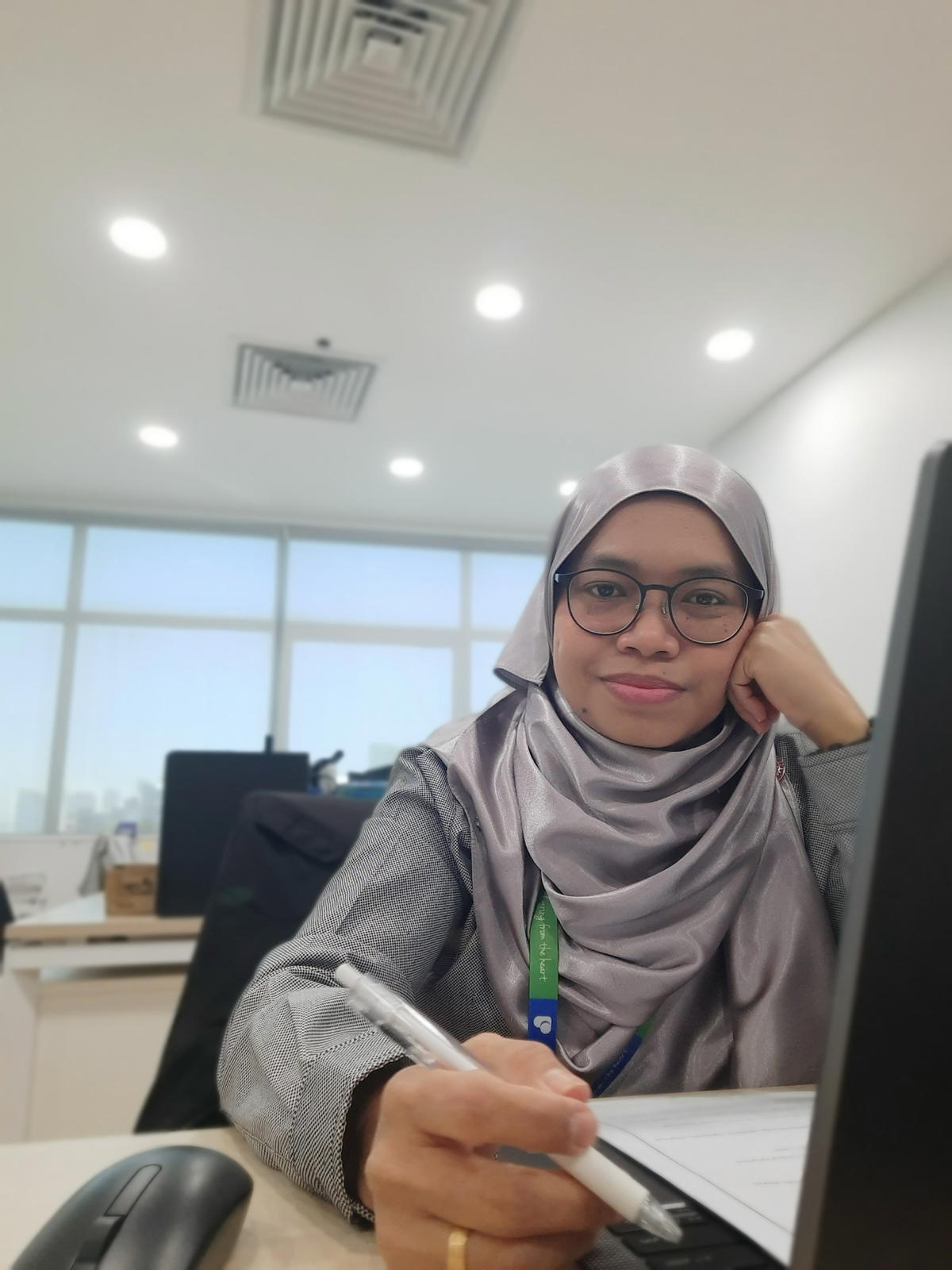Mazwin selfie while working