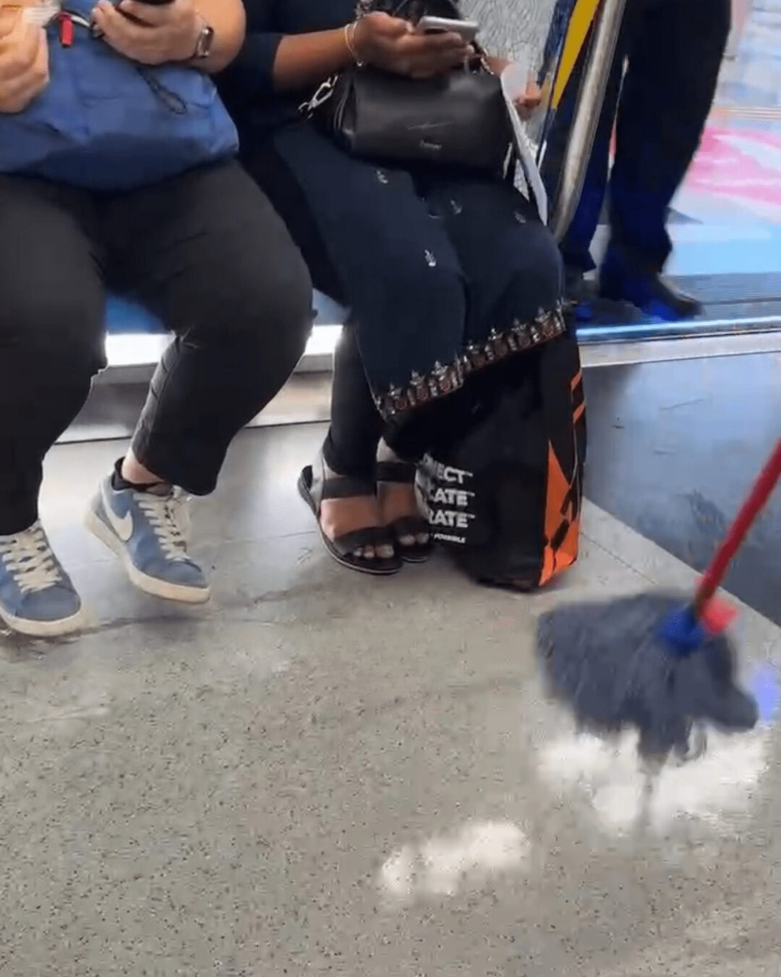 Mopping MRT floor