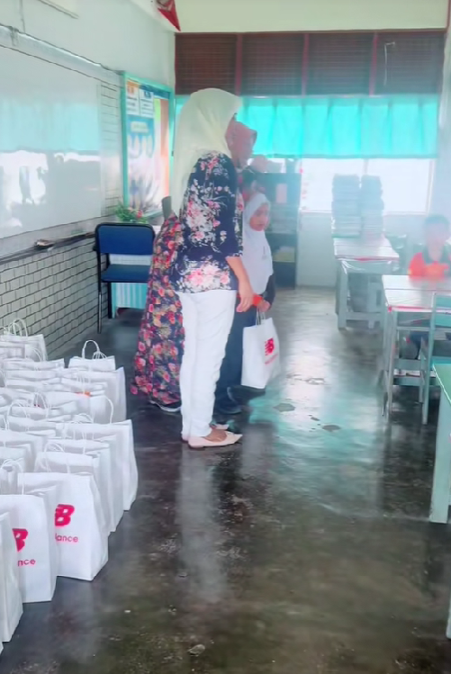 mother of a student who gifts all student brand new shoes on the last day of school