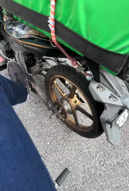motorbike with snapped chain